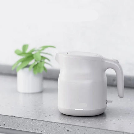 Compact 1360W Electric Kettle with Durable Stainless Steel Interior