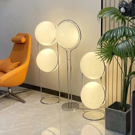 White Acrylic Globe Floor Lamp with Chrome Base – Modern Planet-Inspired Design